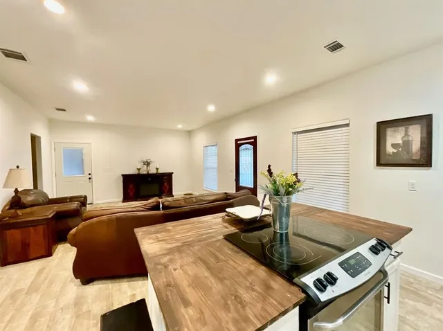 a living room with furniture and a table