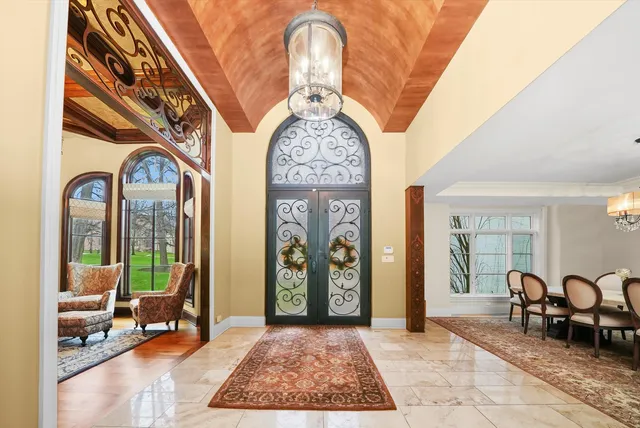 a view of an entryway with a rug