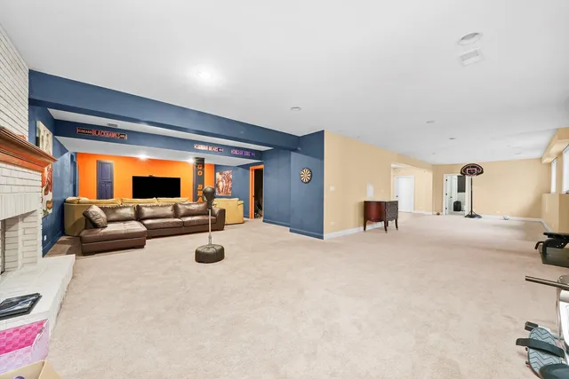 an aerial view of a house with outdoor space and garden