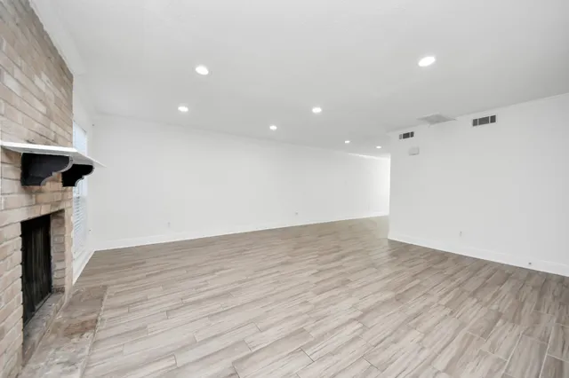 a bathroom with a sink toilet a shower and a mirror