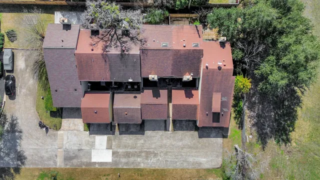 an aerial view of a city with lots of residential buildings