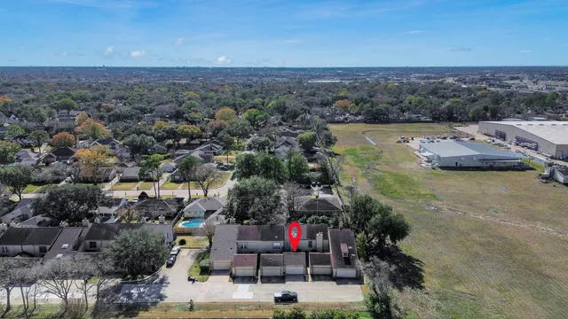 an aerial view of residential building with outdoor space