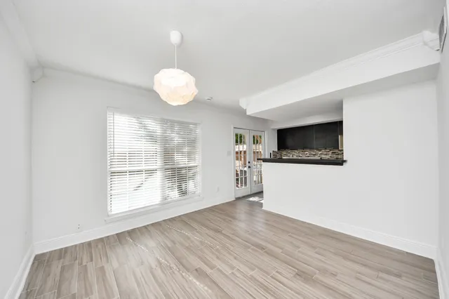a kitchen that has a sink and a stove
