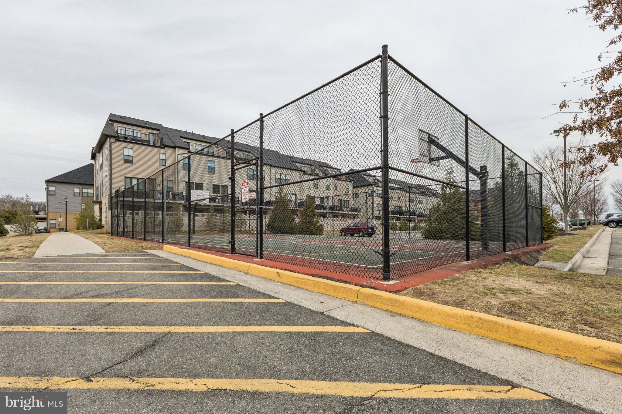 6301 Edsall Road, Unit 513 Alexandria, VA 22312 - Photo 13 of 38 a view of a houses with basketball court