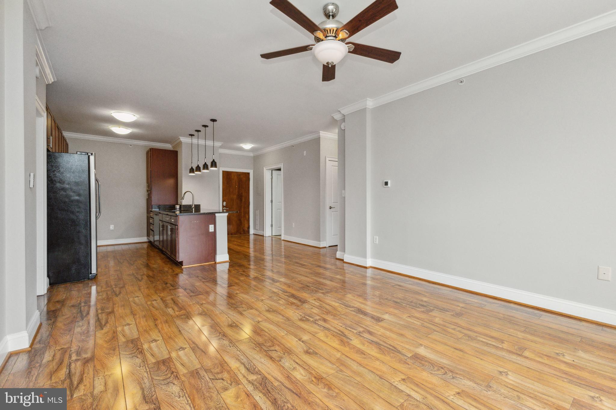6301 Edsall Road, Unit 513 Alexandria, VA 22312 - Photo 19 of 38 a view of a livingroom with a kitchen