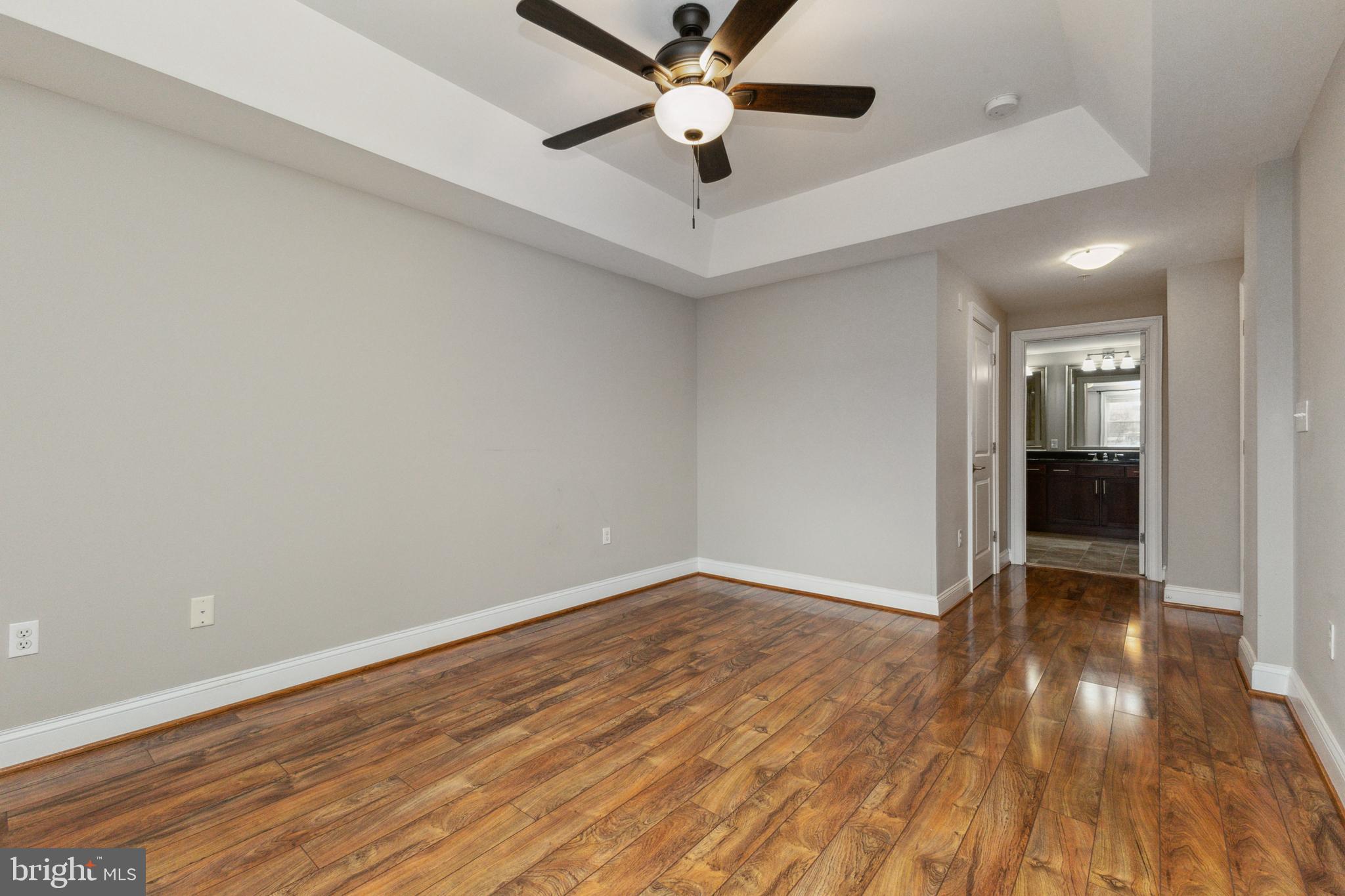 6301 Edsall Road, Unit 513 Alexandria, VA 22312 - Photo 29 of 38 wooden floor in an empty room with a window