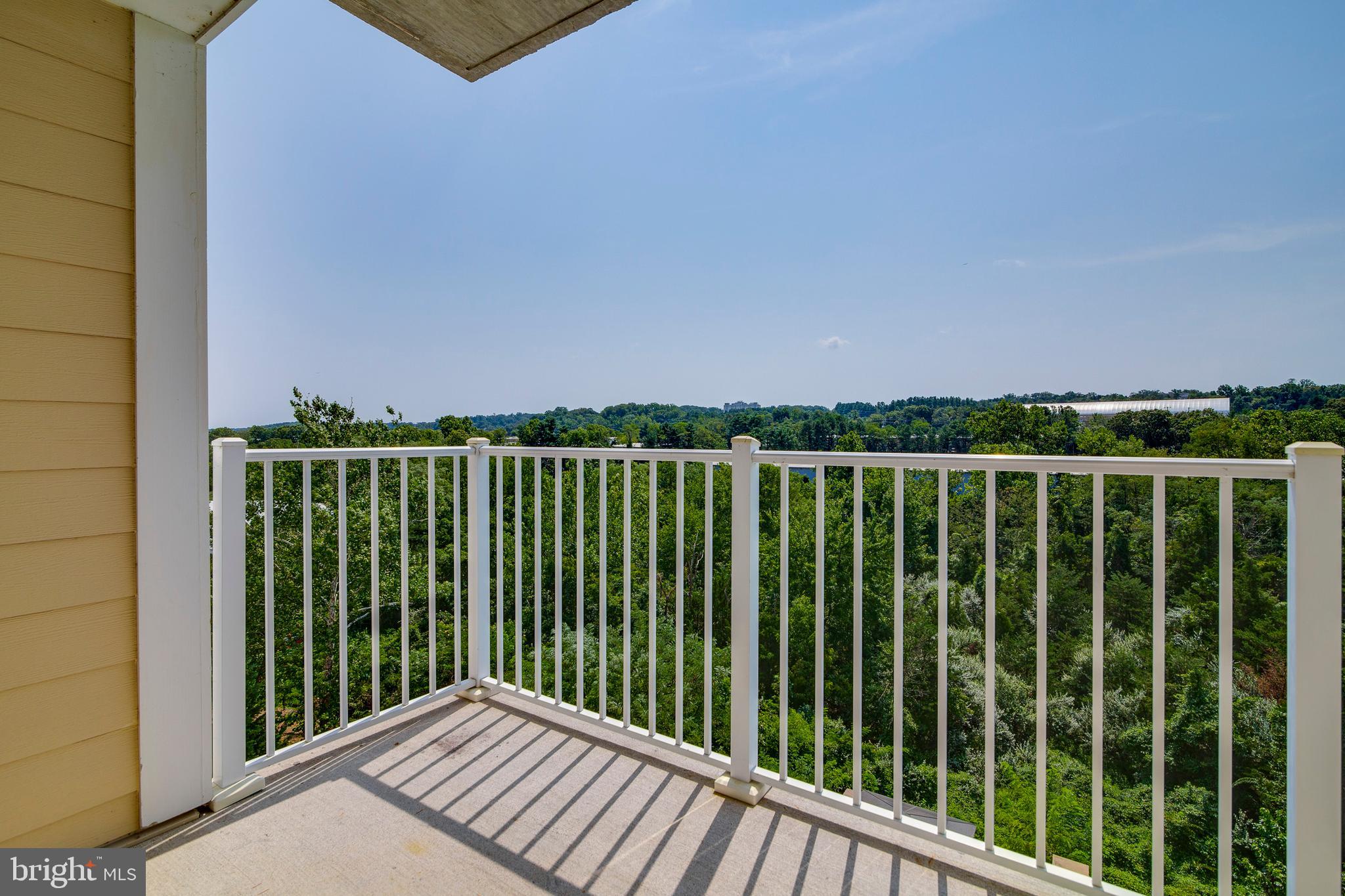 6301 Edsall Road, Unit 513 Alexandria, VA 22312 - Photo 33 of 38 a balcony with a garden