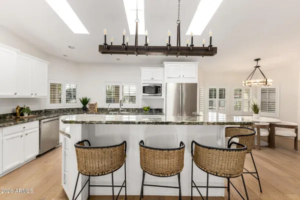 a bathroom with a bathtub and window