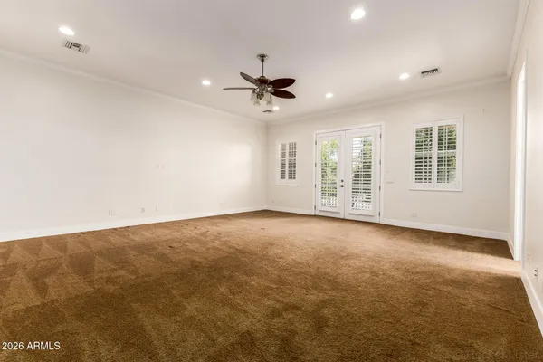 a kitchen with a sink cabinets and utility