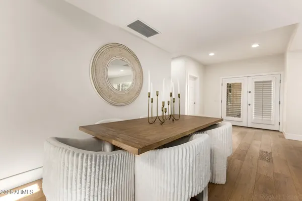 a kitchen with stove and cabinets