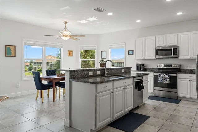 a view of a balcony with chairs