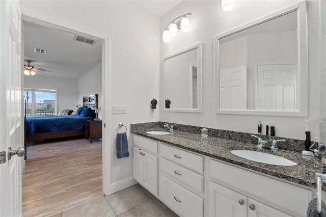 a front view of house with yard barbeque oven and outdoor seating