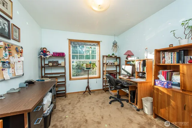 a view of a workspace with furniture and toys