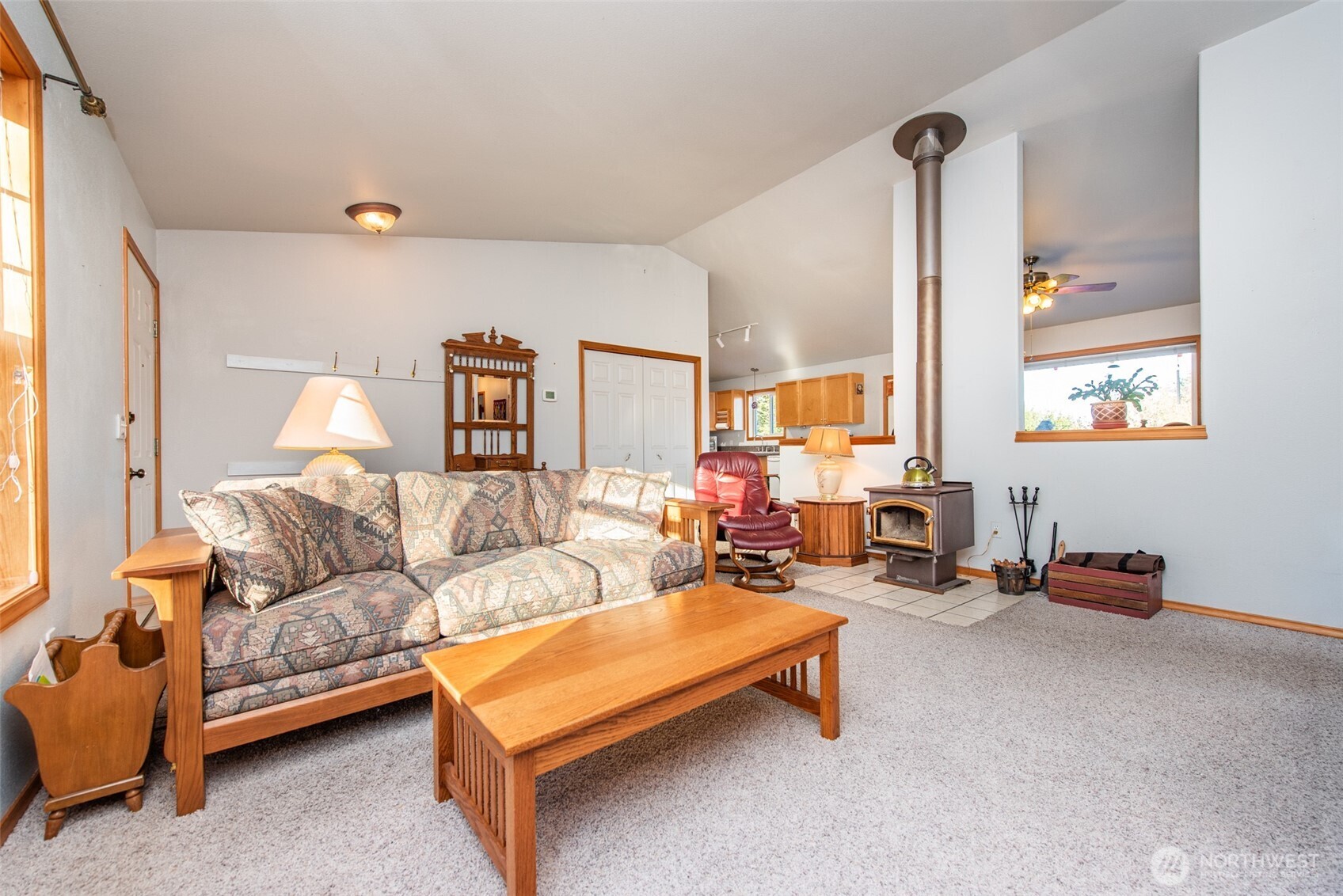 72 West Quail Lane Sequim, WA 98382 - Photo 5 of 29 a living room with furniture gym equipment and a large window