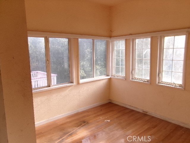 17392 Cache Creek Road Clearlake Oaks, CA 95423 - Photo 13 of 25 a view of an empty room with a window
