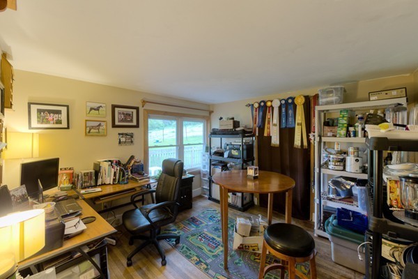 135 Fenton Road Monson, MA 01057 - Photo 12 of 30 a room with furniture and a bookshelf