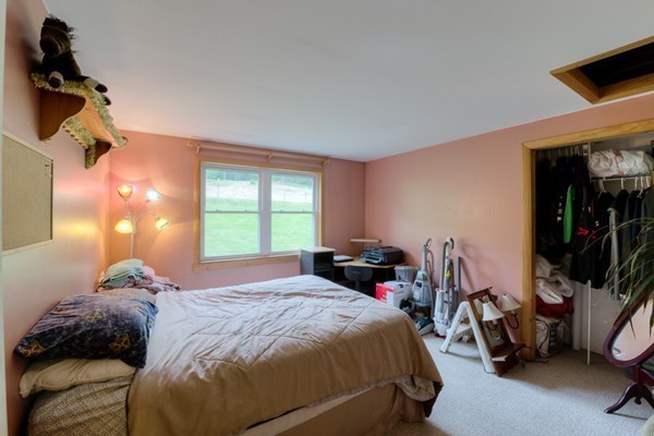135 Fenton Road Monson, MA 01057 - Photo 14 of 30 a bedroom with a bed and a window