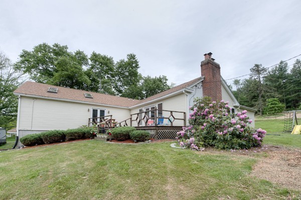 135 Fenton Road Monson, MA 01057 - Photo 29 of 30 a front view of a house with garden