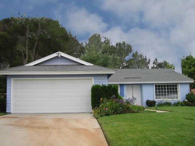 104 Witham Road Encinitas, CA 92024 - Photo 1 of 1 a front view of a house with a yard and garage