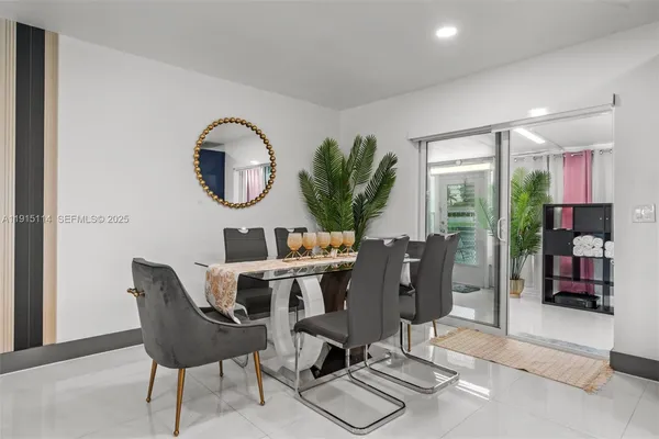 a view of a dining room with furniture