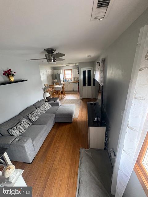219 Connor Street Norristown, PA 19401 - Photo 12 of 38 a living room with furniture and a chandelier