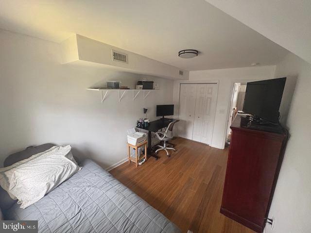 219 Connor Street Norristown, PA 19401 - Photo 15 of 38 a bed room with a bed and a chair