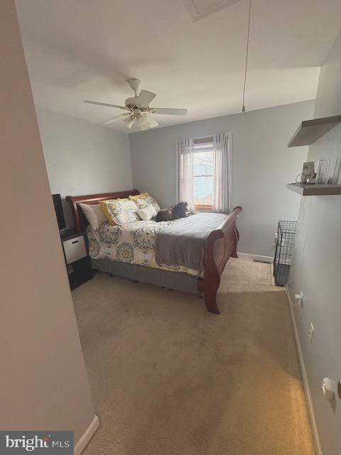 219 Connor Street Norristown, PA 19401 - Photo 26 of 38 a bed room with a bed and a ceiling fan