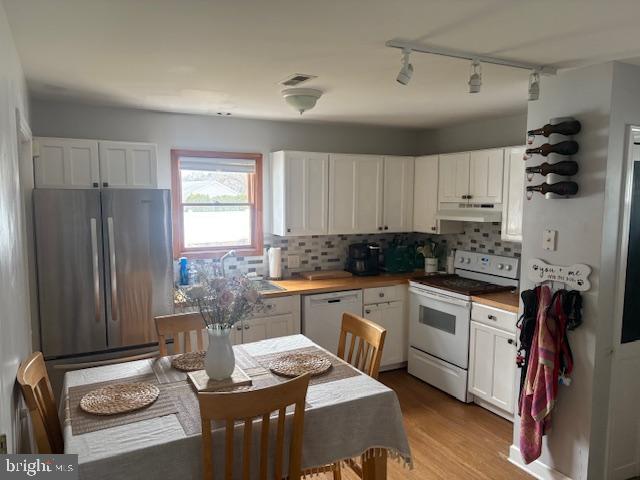 219 Connor Street Norristown, PA 19401 - Photo 6 of 38 a kitchen with granite countertop a sink appliances and cabinets