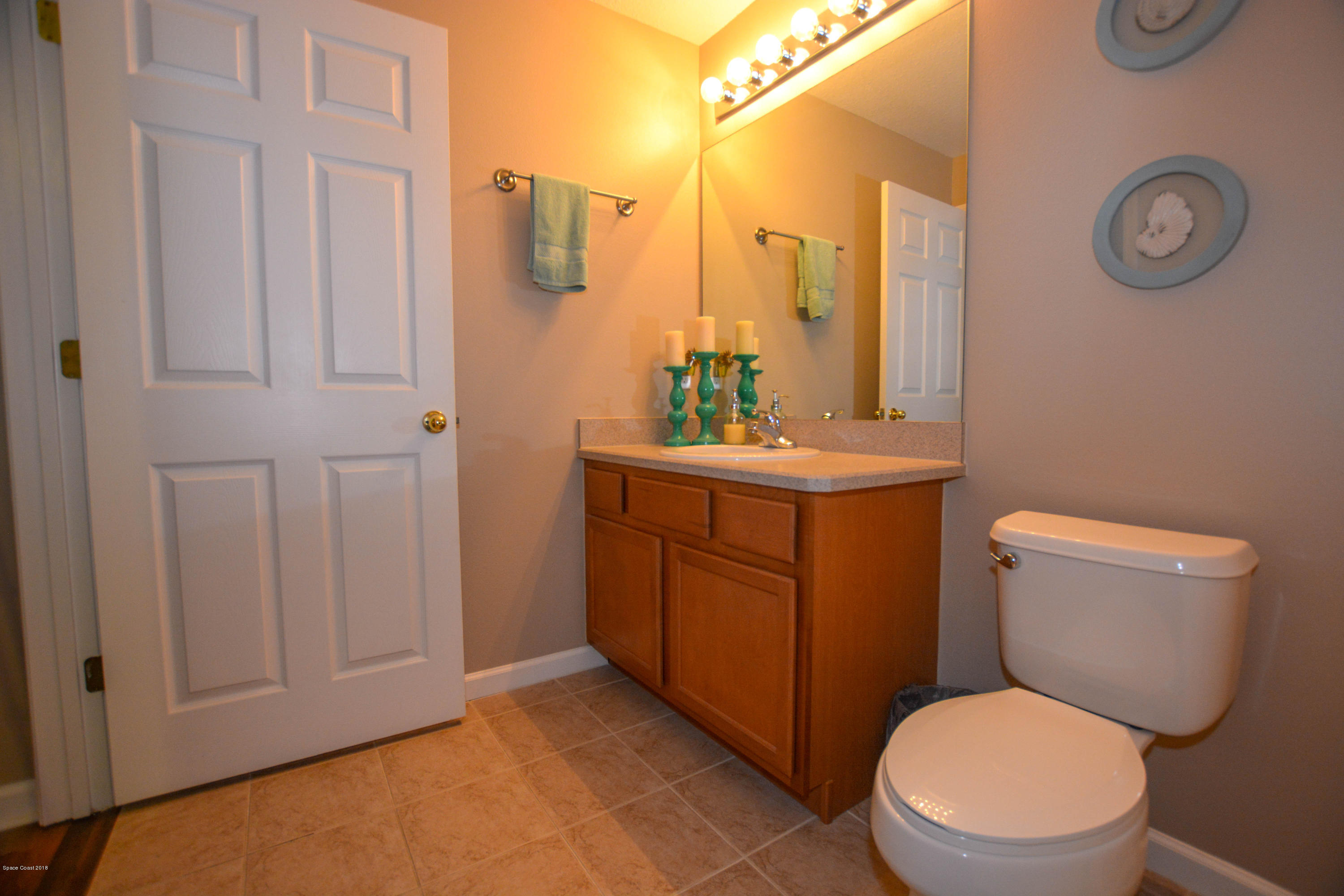 2570 Revolution Street, Unit 101 Melbourne, FL 32935 - Photo 9 of 20 Upstairs Hall Bath