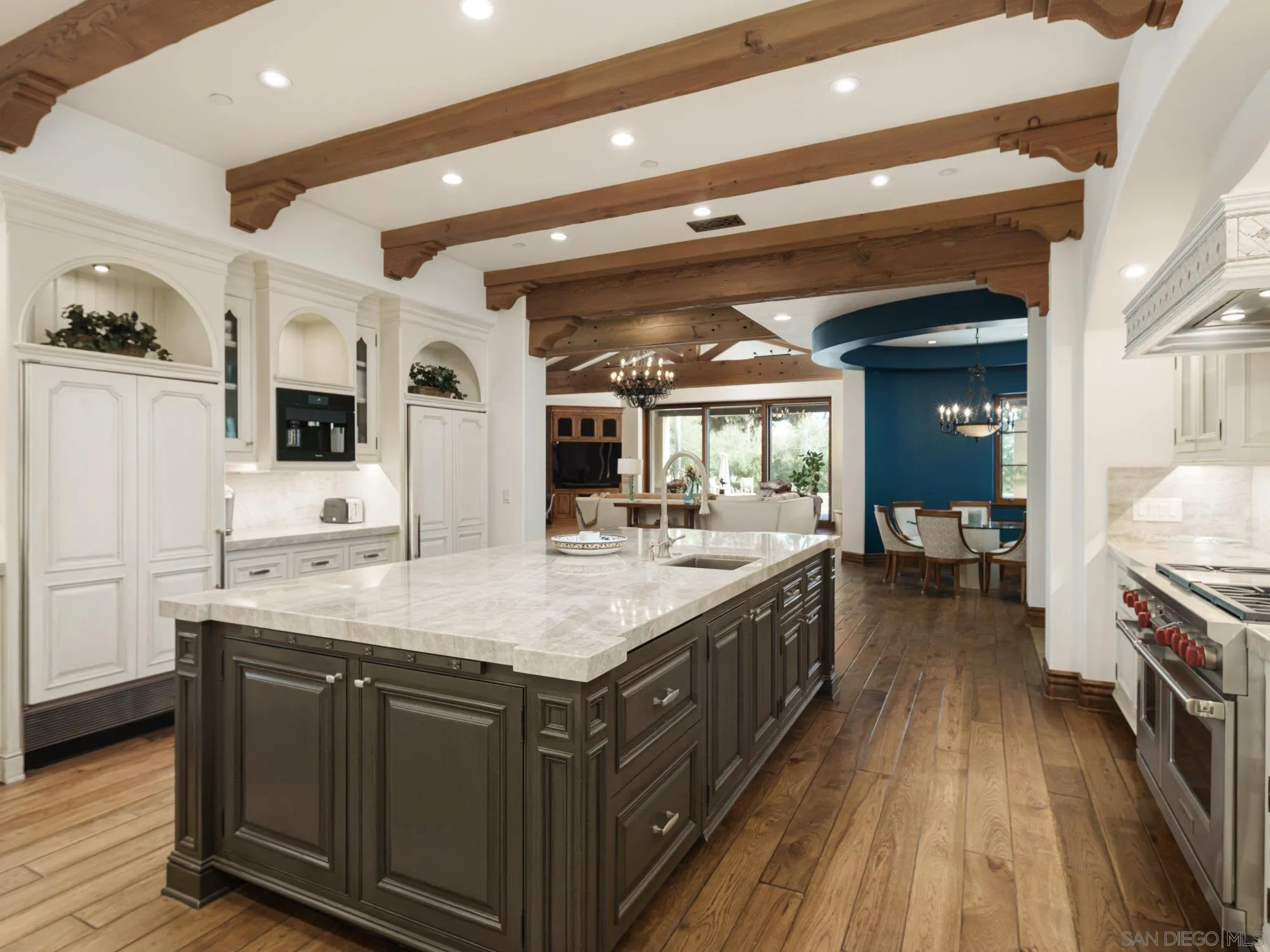 16409 Via De Santa Fe Rancho Santa Fe, CA 92067 - Photo 12 of 41 a spacious bathroom with a granite countertop sink and a large mirror