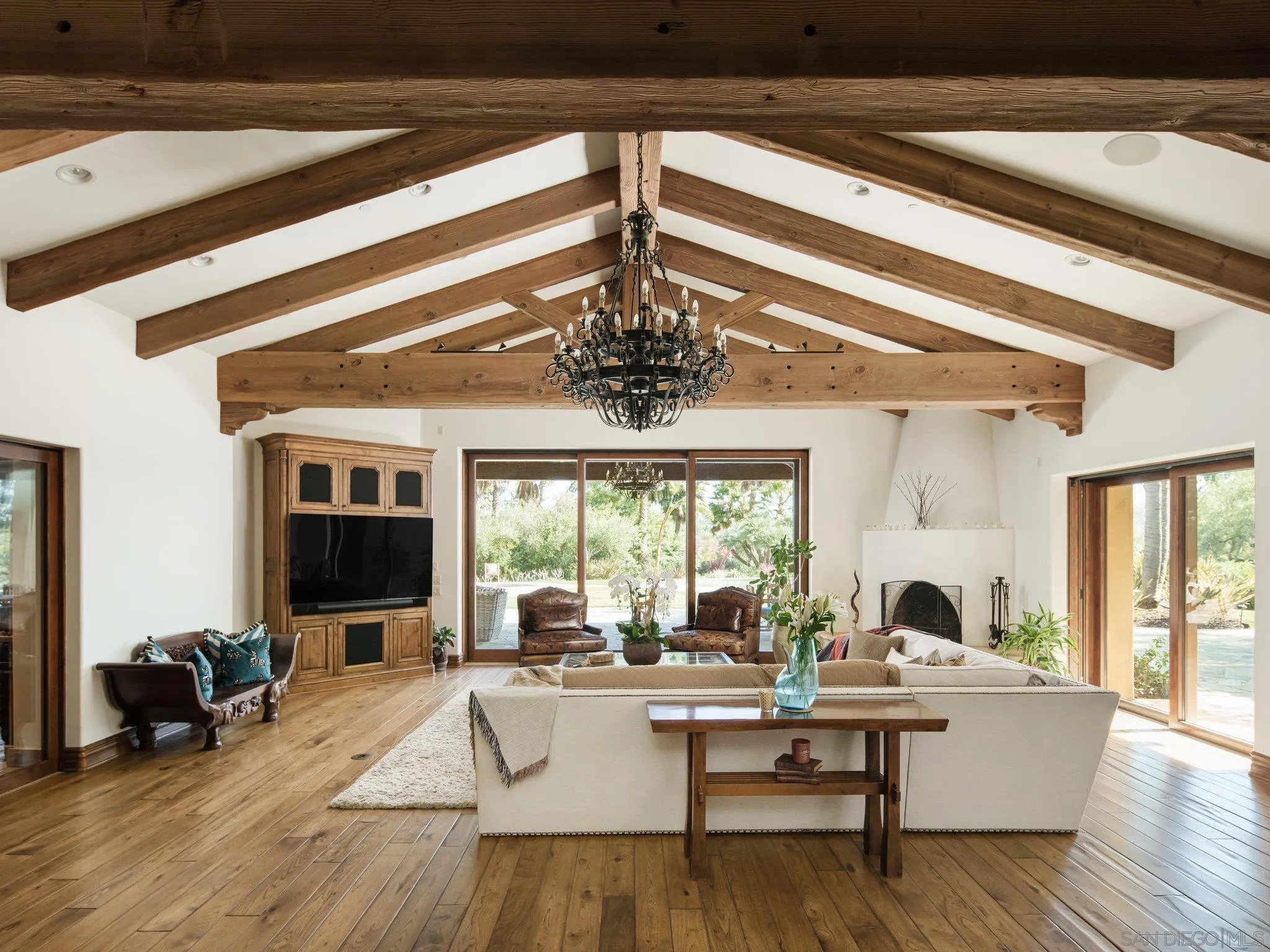 16409 Via De Santa Fe Rancho Santa Fe, CA 92067 - Photo 13 of 41 a view of a living room and dining room