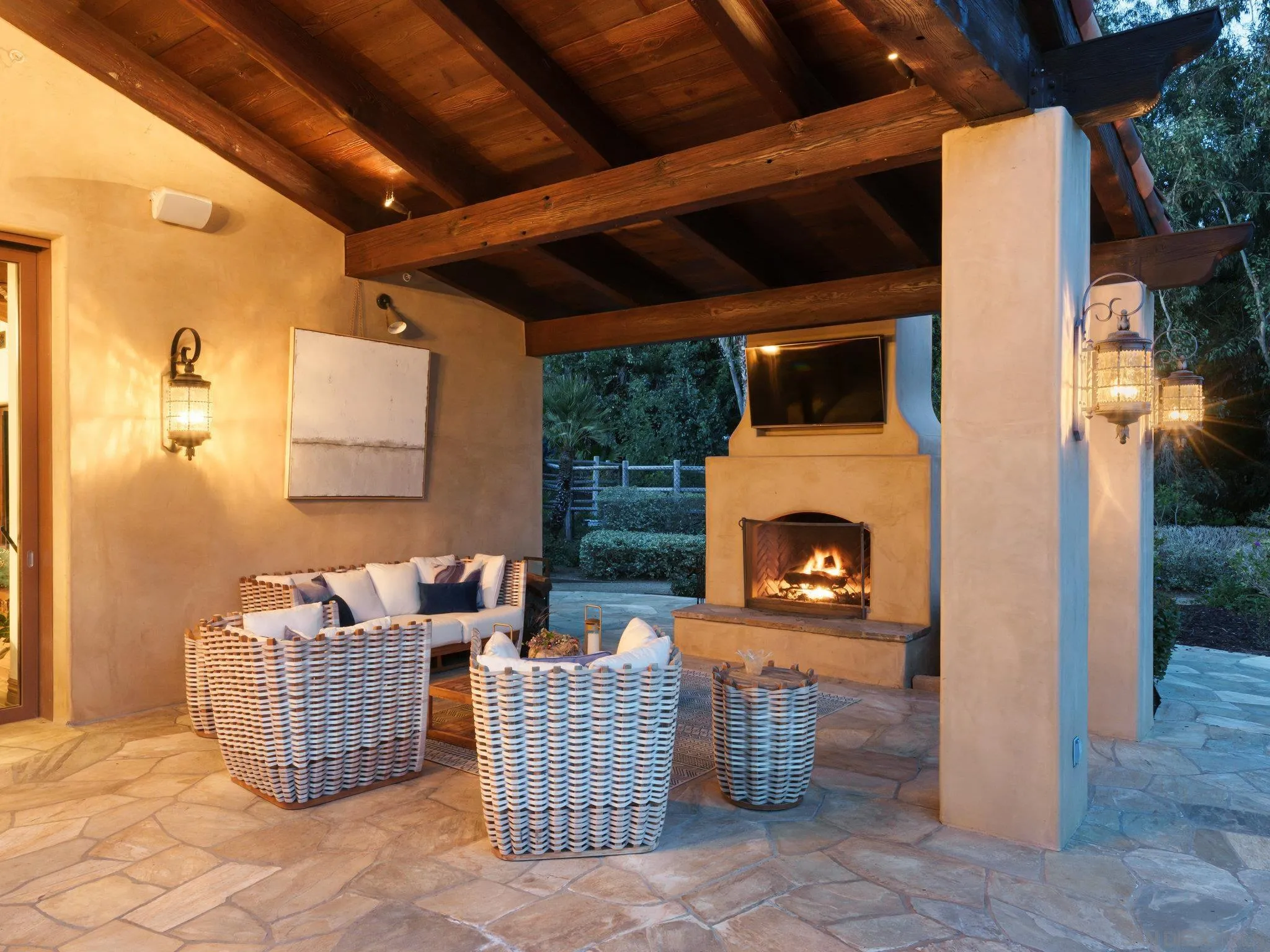 16409 Via De Santa Fe Rancho Santa Fe, CA 92067 - Photo 30 of 41 a living room with furniture a fireplace and a garden