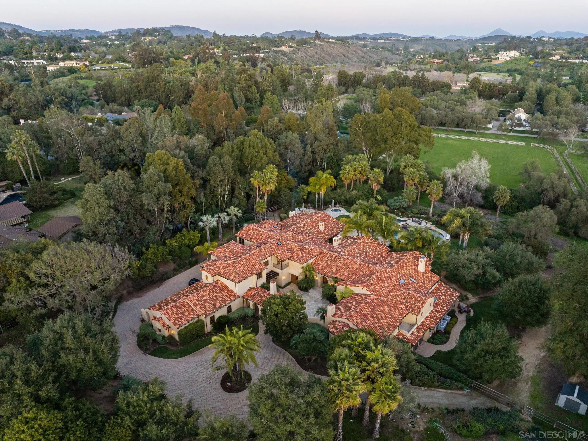 16409 Via De Santa Fe Rancho Santa Fe, CA 92067 - Photo 32 of 41 an aerial view of a house with a lake view