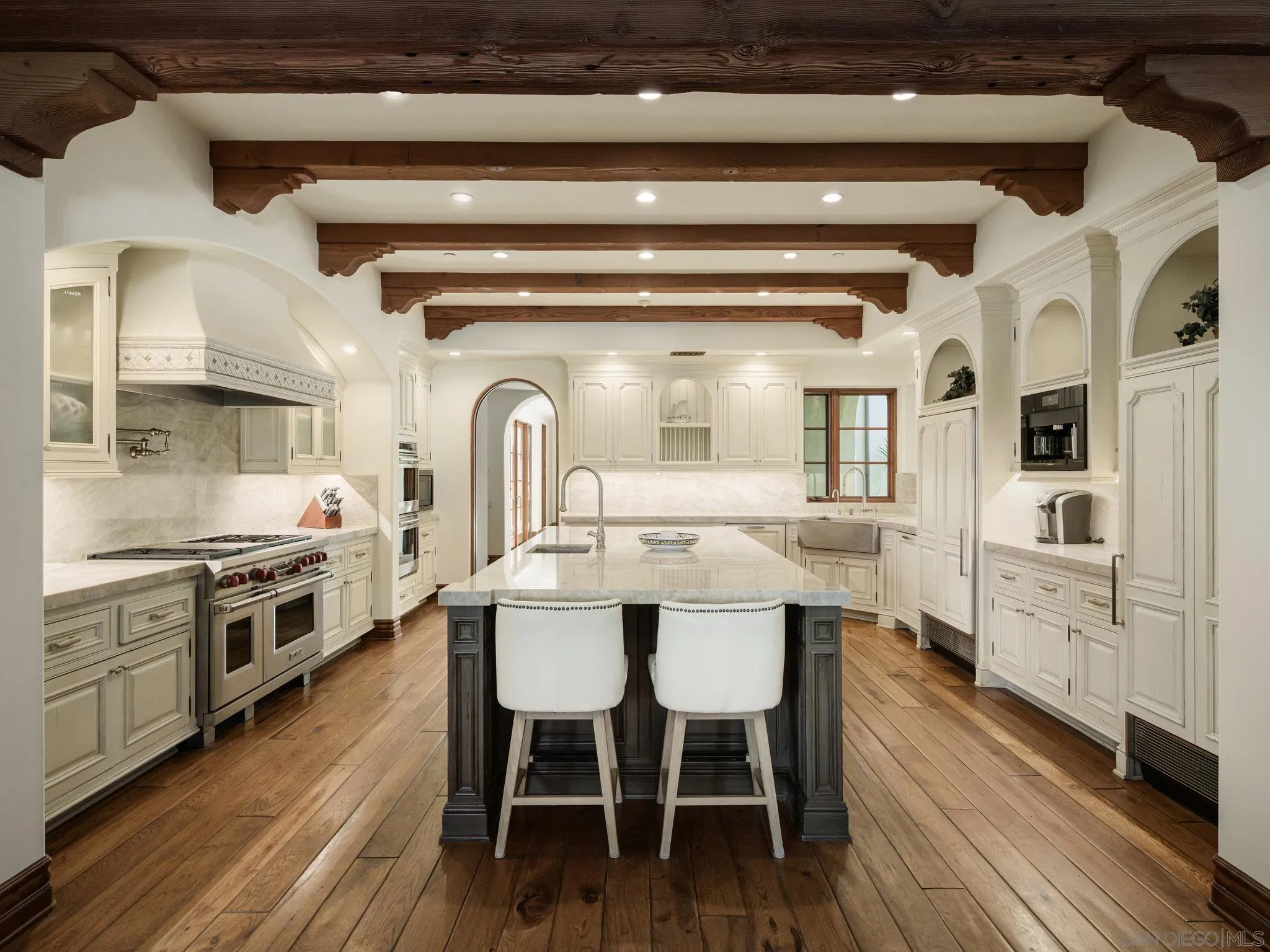 16409 Via De Santa Fe Rancho Santa Fe, CA 92067 - Photo 9 of 41 a view of a dining room with furniture and wooden floor