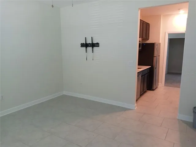 a view of a storage & utility room with a sink