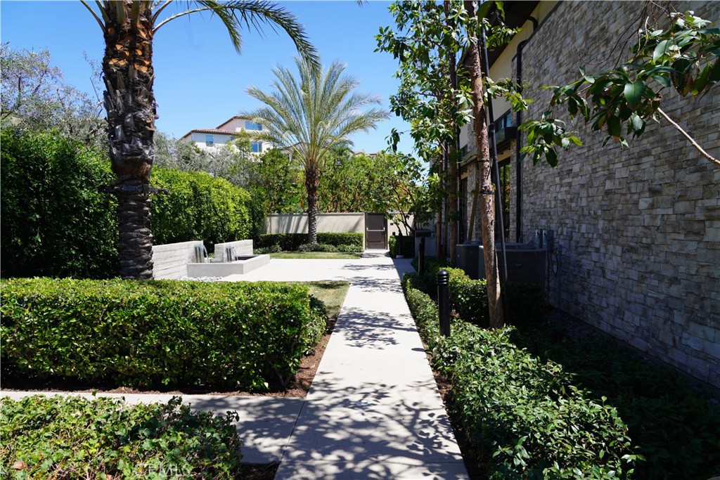 263 Carmona Lake Forest, CA 92630 - Photo 11 of 15 a view of a garden with a fountain