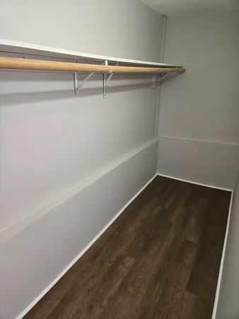 a view of a room with rack on the wall