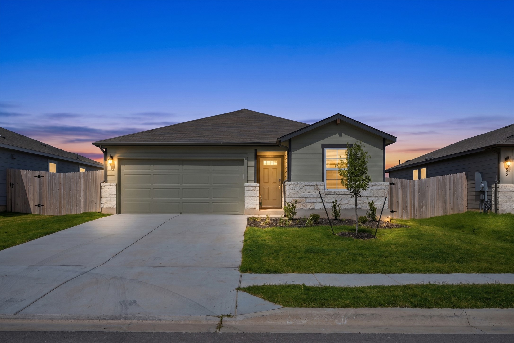 121 Honey Bee Road Jarrell, TX 76537 - Photo 2 of 25 a front view of a house with a yard