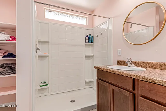 a shelf with cup and plates