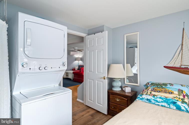 32789 Cedar Drive Ocean View, DE 19970 - Photo 10 of 18 a bedroom with a bed and wooden floor