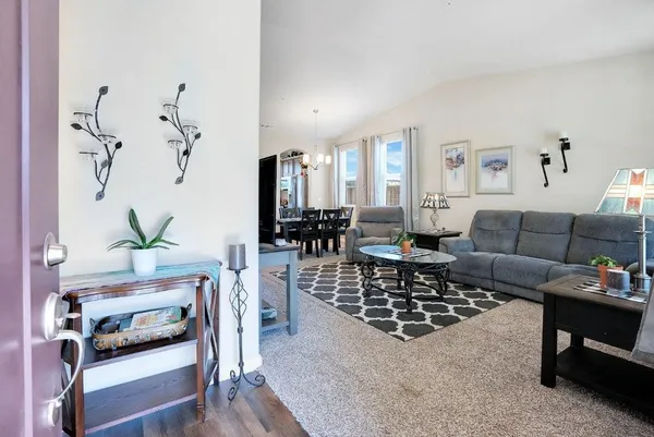 a living room with furniture and a couch