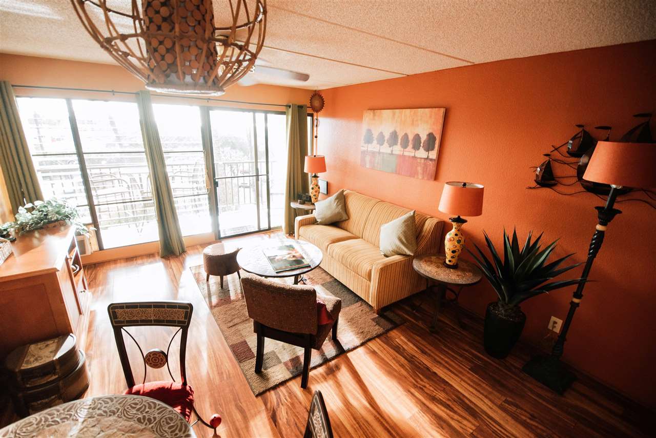 2531 South Kihei Road, Unit D210 Kihei, HI 96753 - Photo 6 of 23 a living room with furniture a rug and a large window