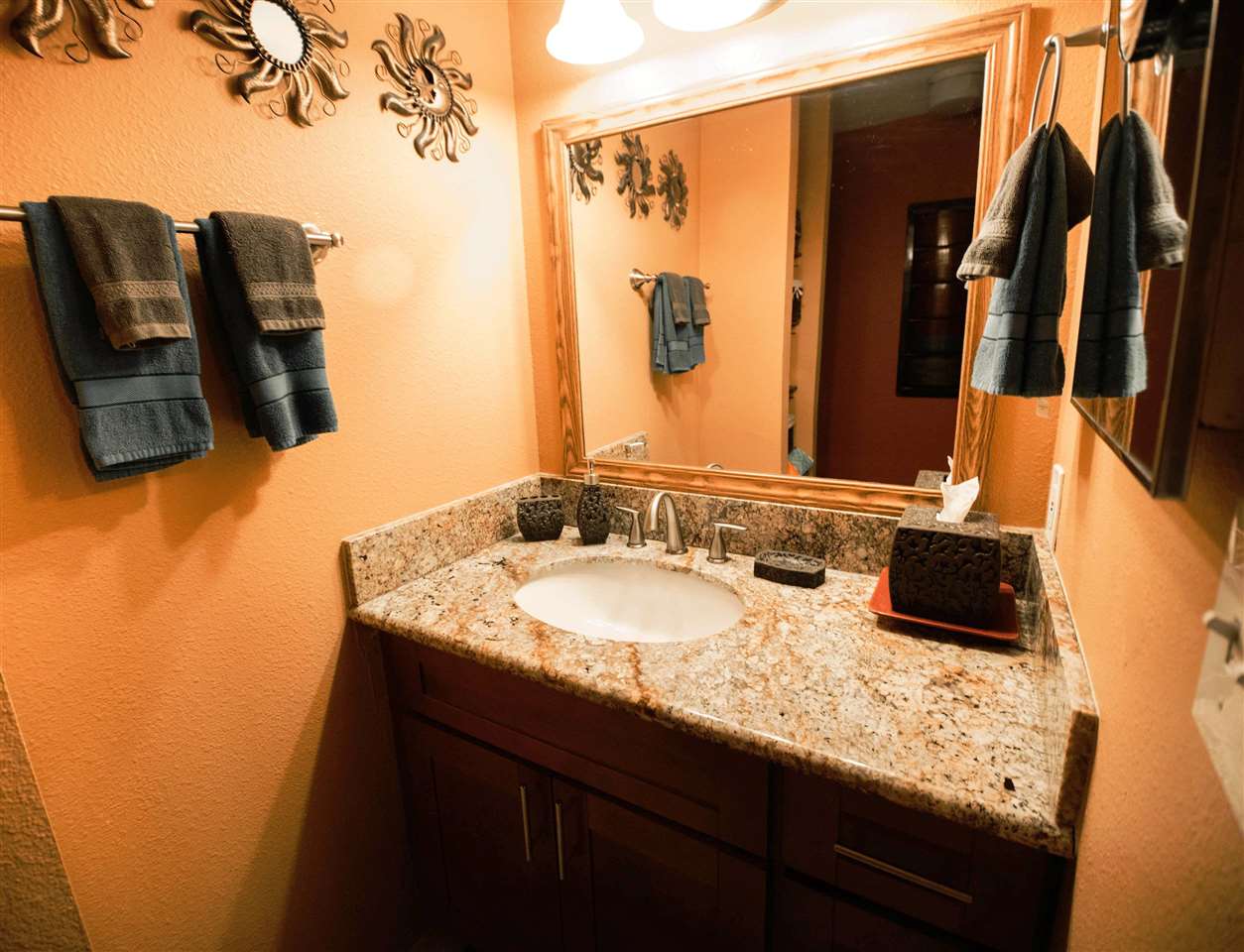 2531 South Kihei Road, Unit D210 Kihei, HI 96753 - Photo 10 of 23 a bathroom with a granite countertop sink a mirror and shower curtain
