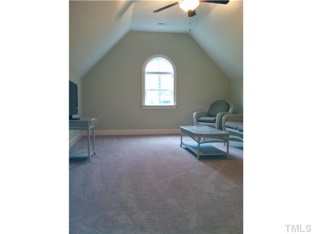 7628 Pinecrest Road Raleigh, NC 27613 - Photo 16 of 25 4th Bedroom on second floor which could also be used as Bonus Room features nice closet and tons of add'l storage Bedroom