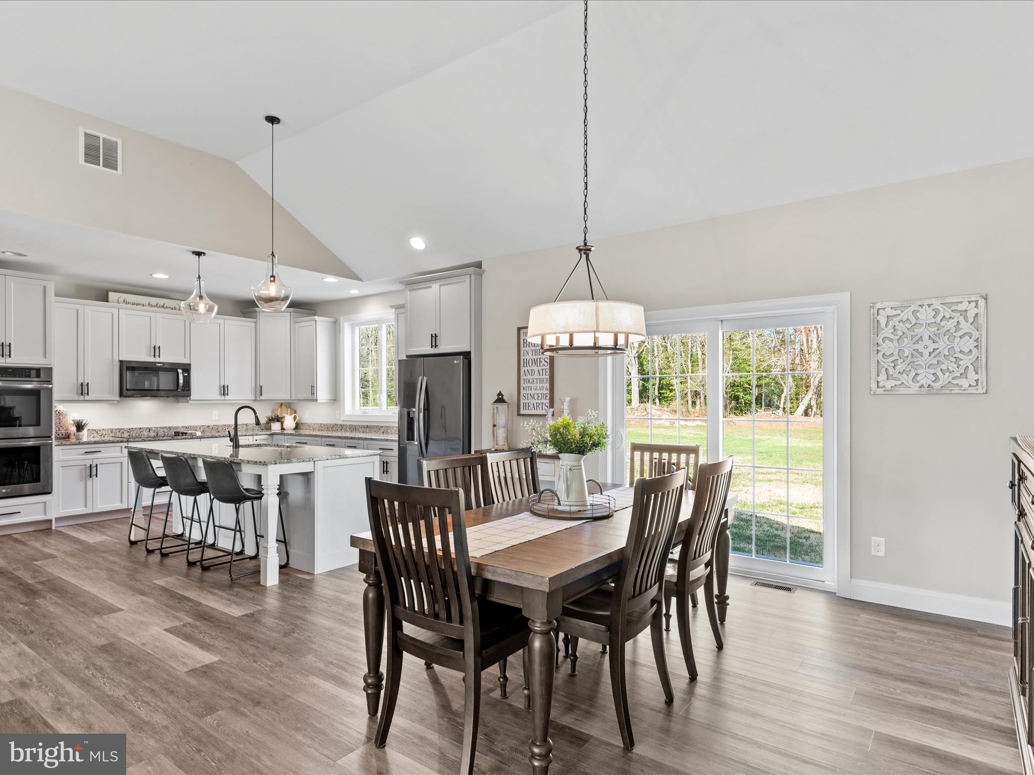 20355 Cool Spring Road Milton, DE 19968 - Photo 21 of 54 a view of a dining room with furniture window and outside view