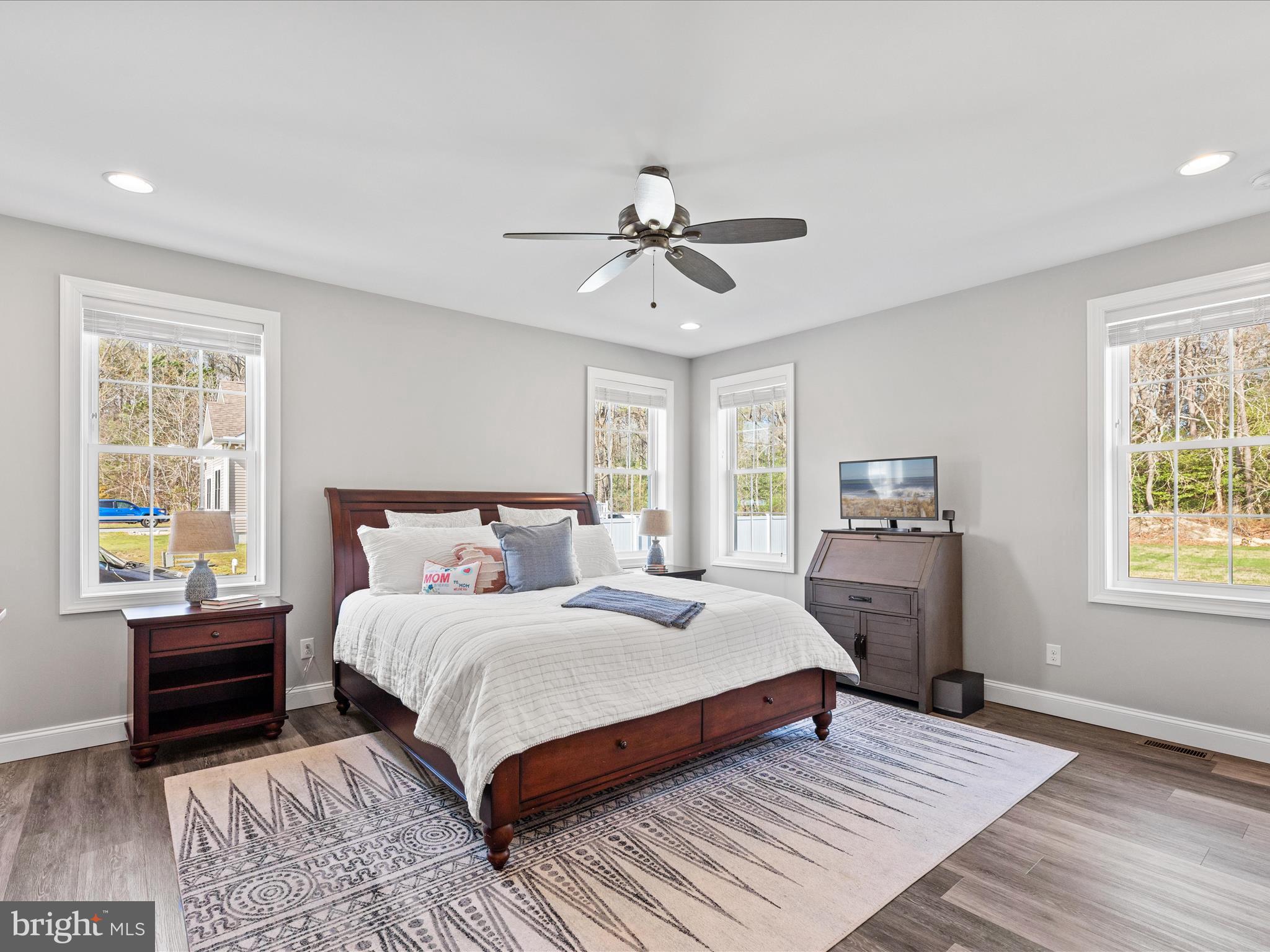 20355 Cool Spring Road Milton, DE 19968 - Photo 26 of 54 a bedroom with a large bed and a window