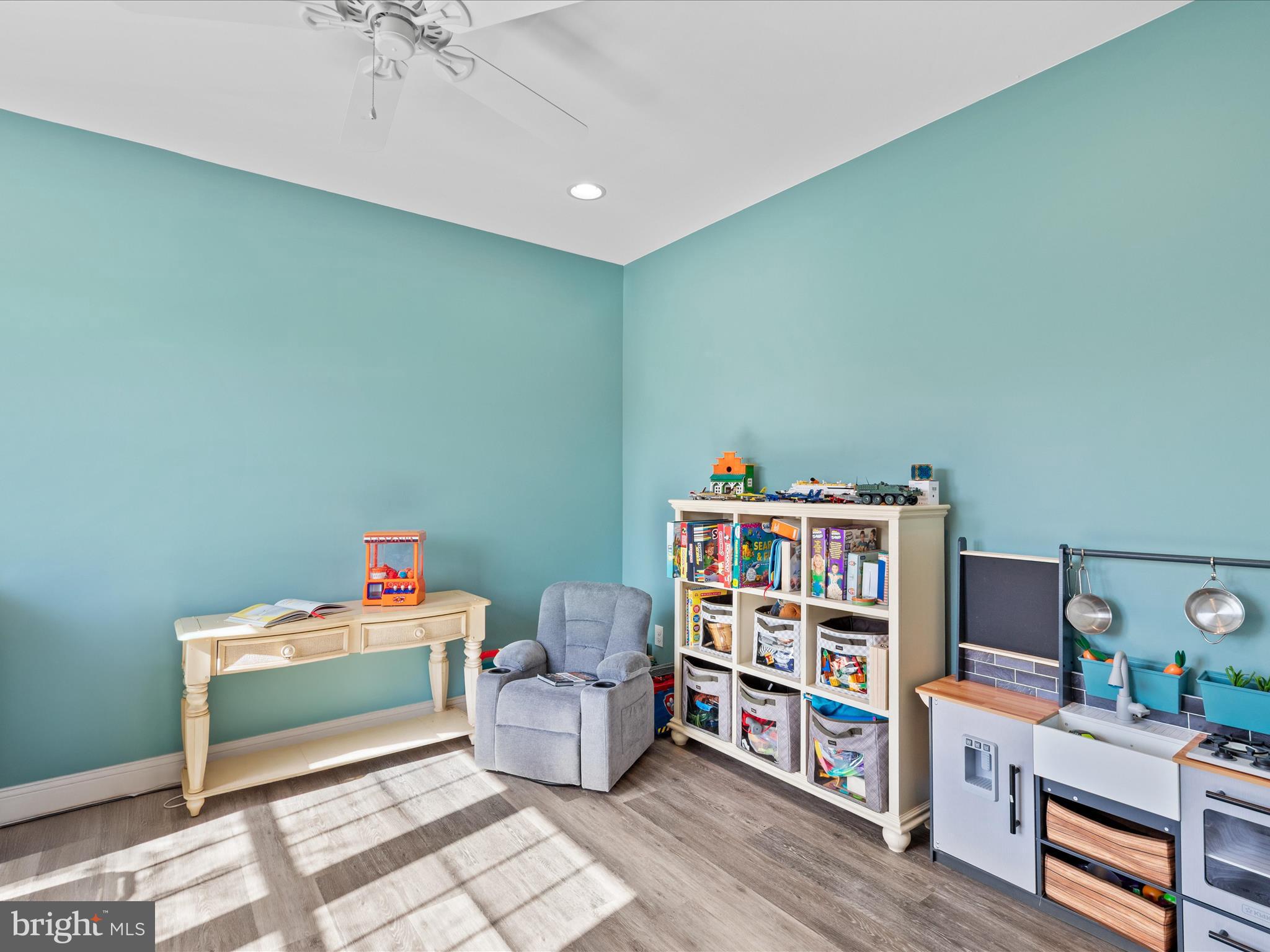 20355 Cool Spring Road Milton, DE 19968 - Photo 33 of 54 a room with furniture a book shelf and a window