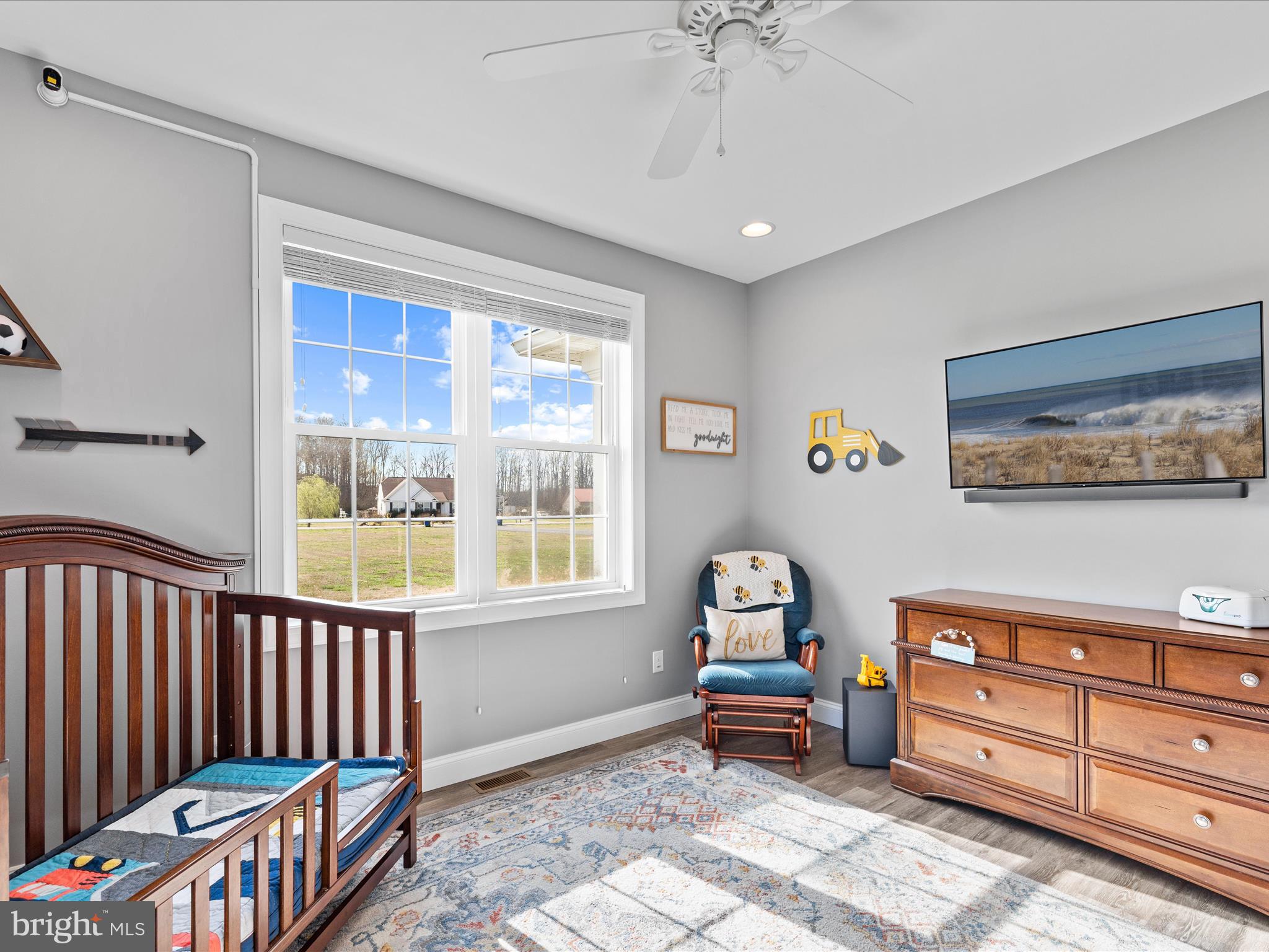 20355 Cool Spring Road Milton, DE 19968 - Photo 39 of 54 a bedroom with furniture and a window