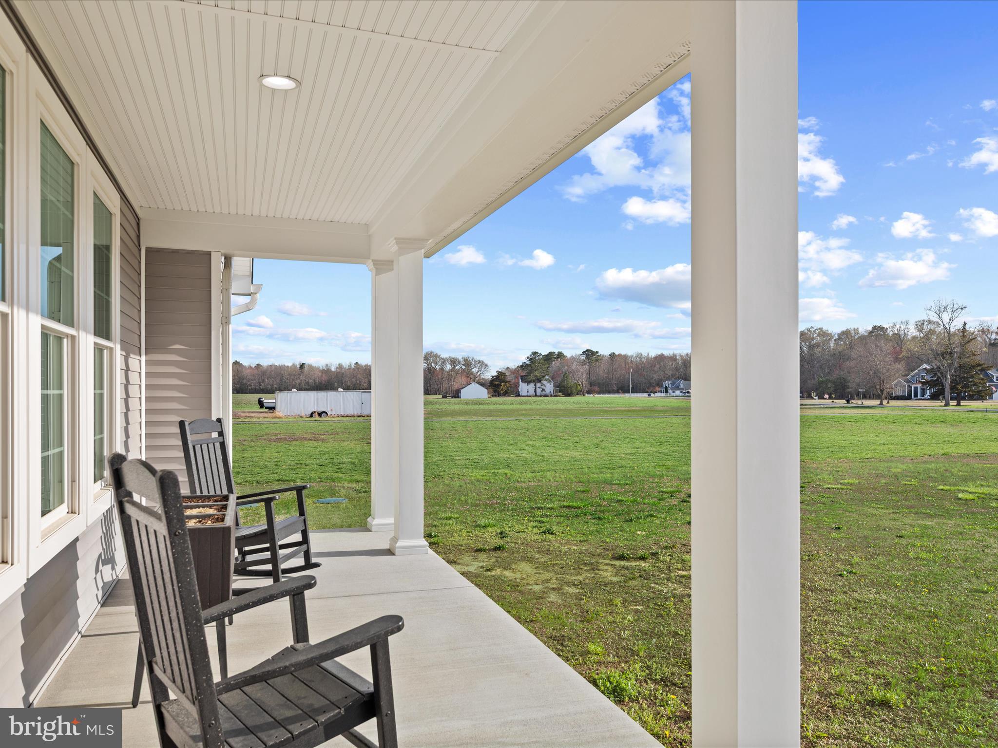 20355 Cool Spring Road Milton, DE 19968 - Photo 4 of 54 a view of swimming pool from balcony with furniture