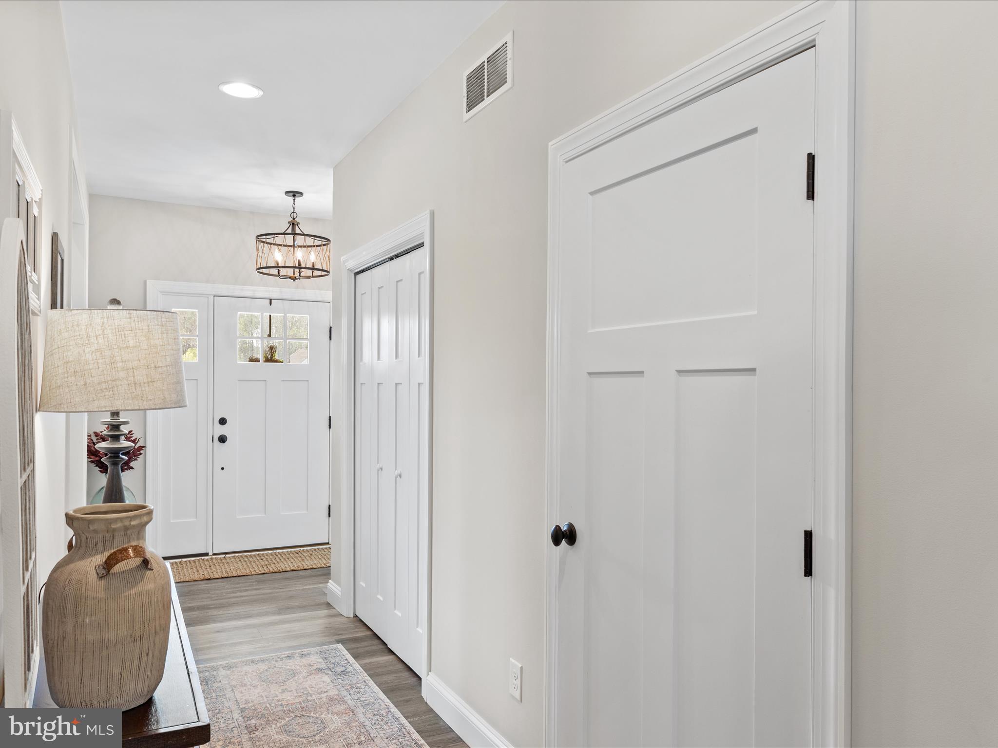 20355 Cool Spring Road Milton, DE 19968 - Photo 5 of 54 a view of hallway with livingroom and bedroom
